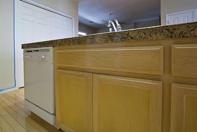 dated cabinets and counter.