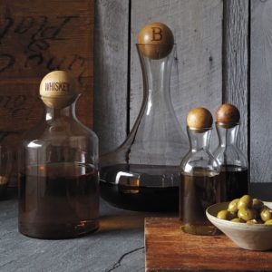 glass bottles with wood stoppers.