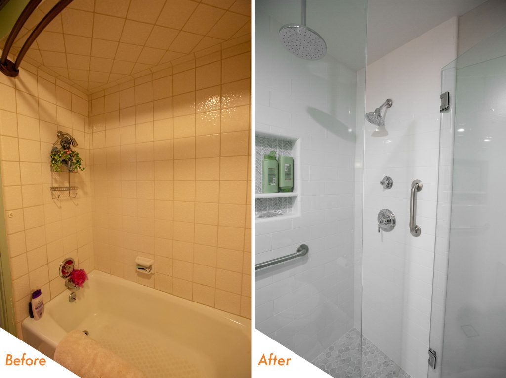 custom shower with a bench and glass enclosure.